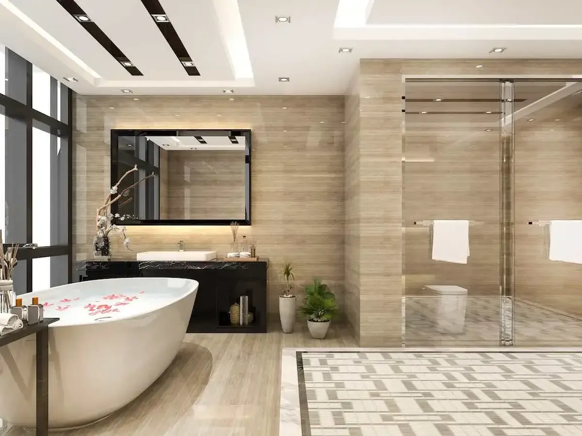 A primary bath with a freestanding tub and glass shower