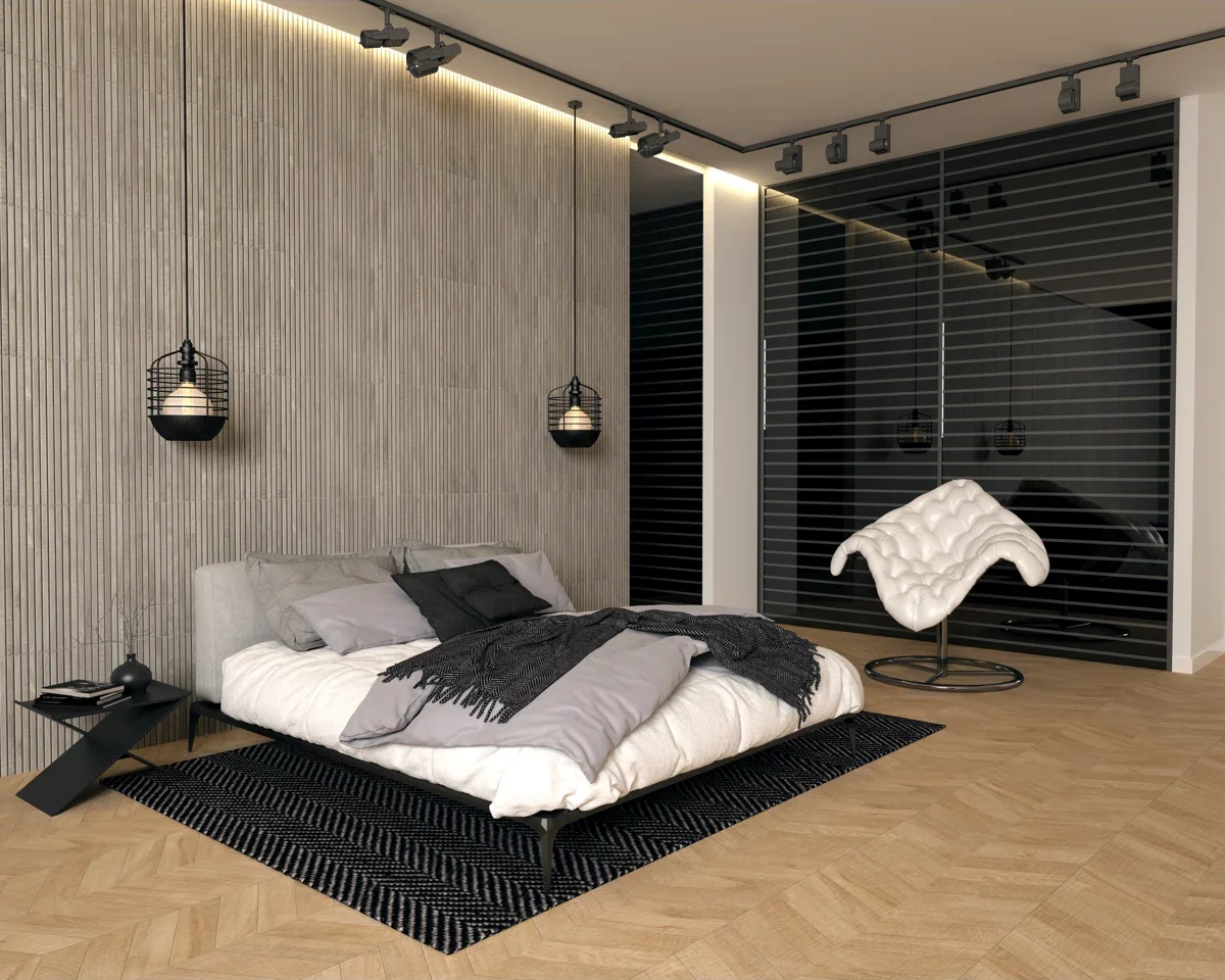 A modern bedroom with chevron oak flooring