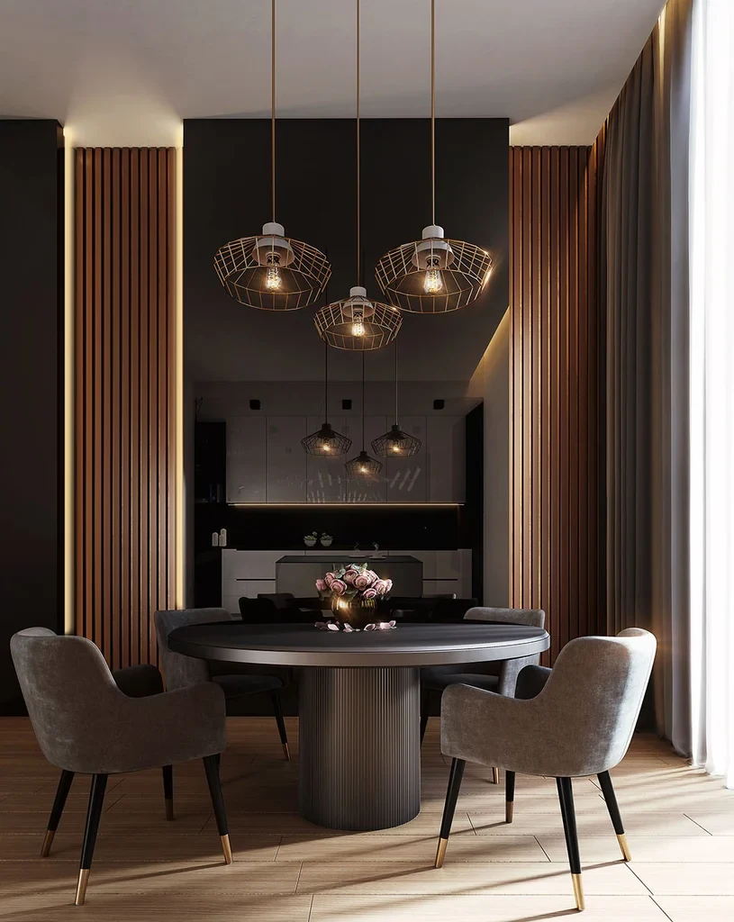 A dark dining room with three cage pendant lights over a round table