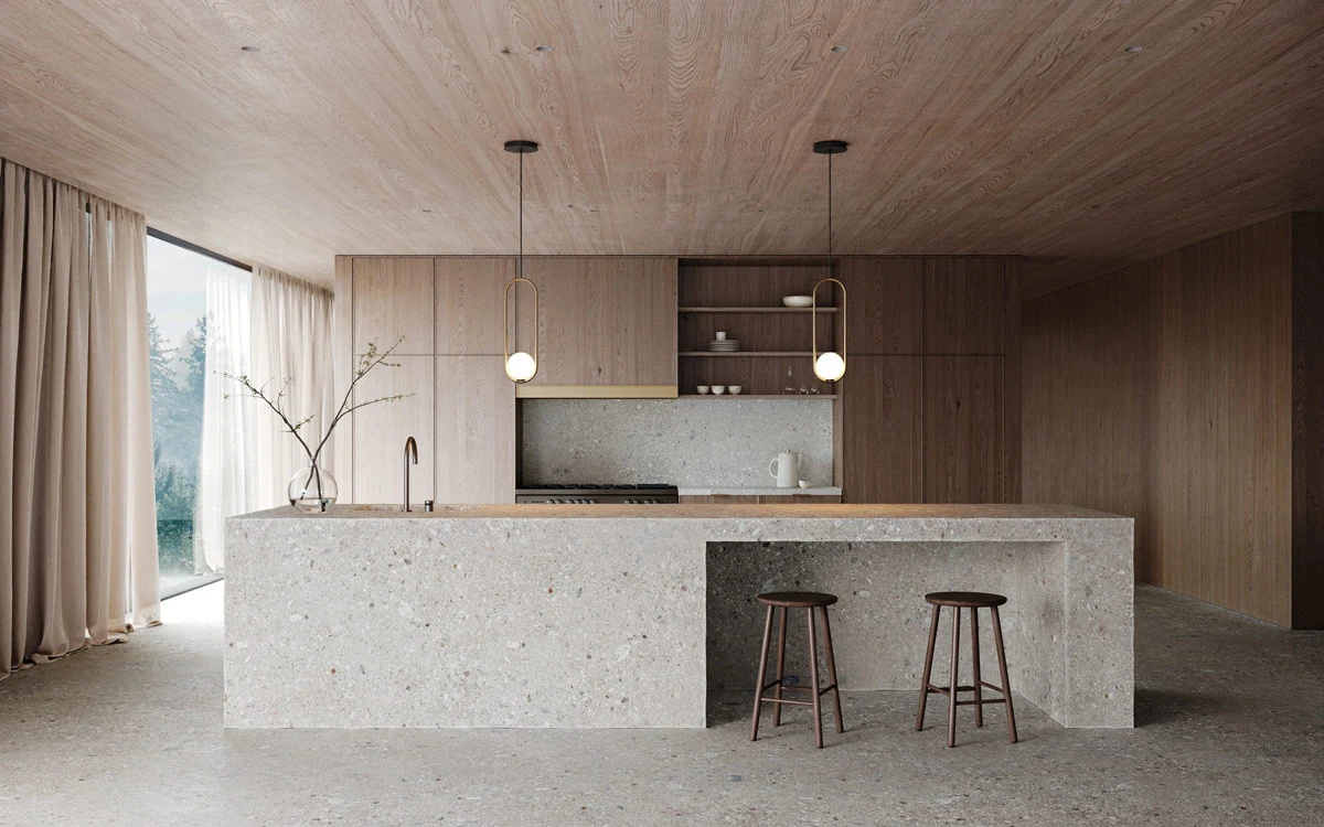 A wood and stone kitchen with two globe pendants over the island